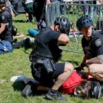 Tensions Erupt at MAYDAY USA Rally in Seattle: A Clash of Ideologies